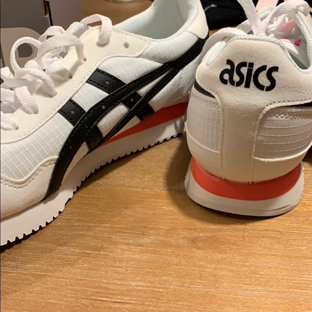 Women’s size 10 ASICS, brand new with tags